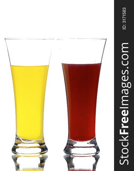 Glasses with juice on the white background