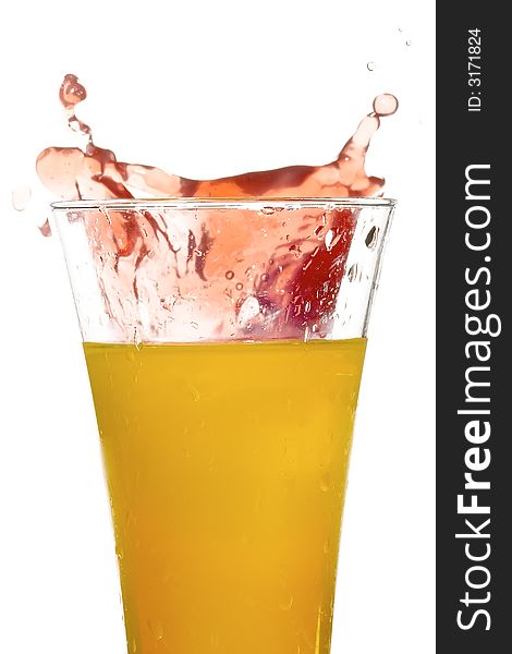 Glass with juice on the white background;