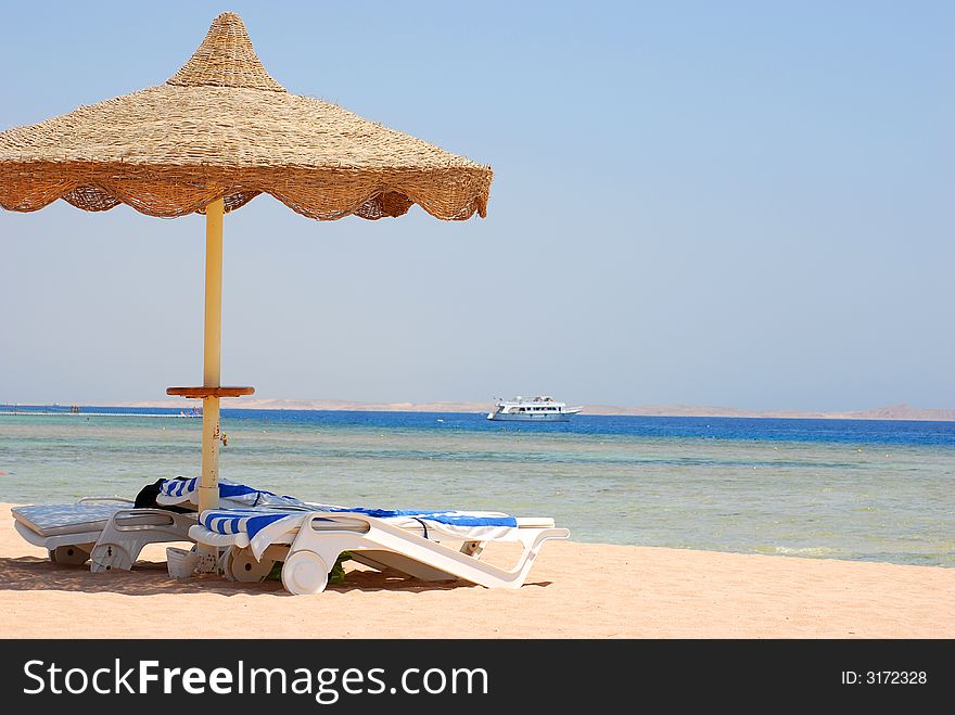 Beach umbrella on a beautiful tropical beach