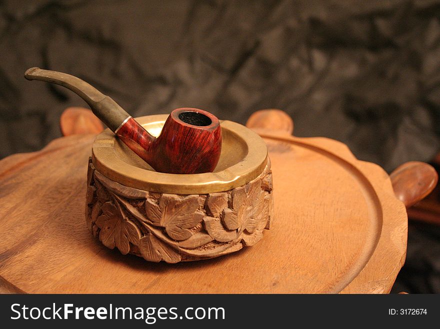 Smoke pipe on arabian table