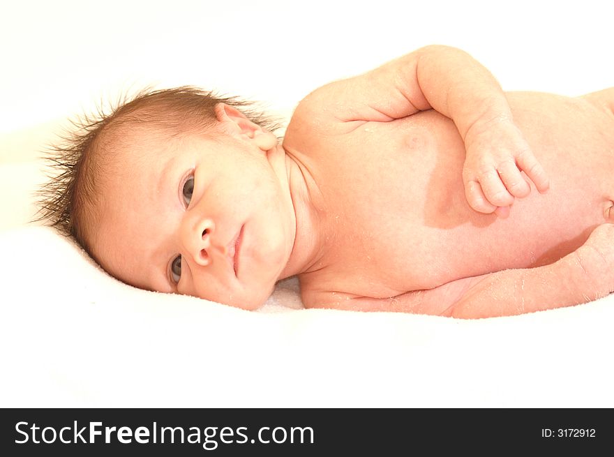 Little ten day old baby boy resting and in the meanwhile being a lovely sweet photomodel. Little ten day old baby boy resting and in the meanwhile being a lovely sweet photomodel