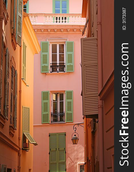Colorful Mediterranean Alleyway with Balconies Windows and Shutters. Colorful Mediterranean Alleyway with Balconies Windows and Shutters