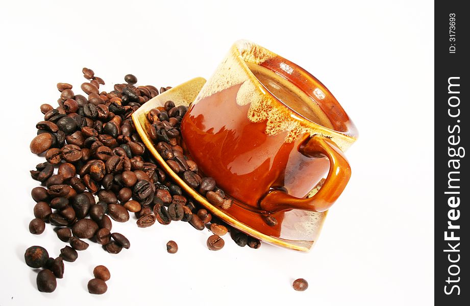 Cup of coffee with coffee beans brew