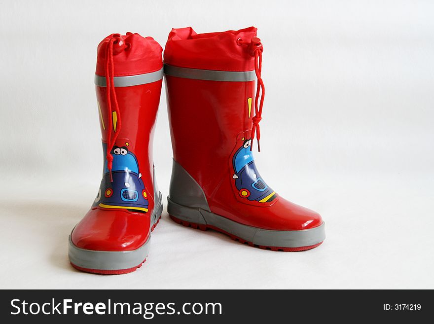 Red wellington boots isolated on white background