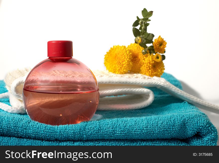 An image of oil and sponge in bathroom. An image of oil and sponge in bathroom