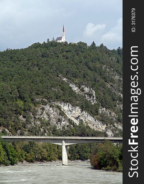 Bridge over the river and hill with Maria Locherboden church. Bridge over the river and hill with Maria Locherboden church