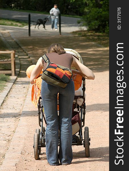 Mum Pushing A Pram