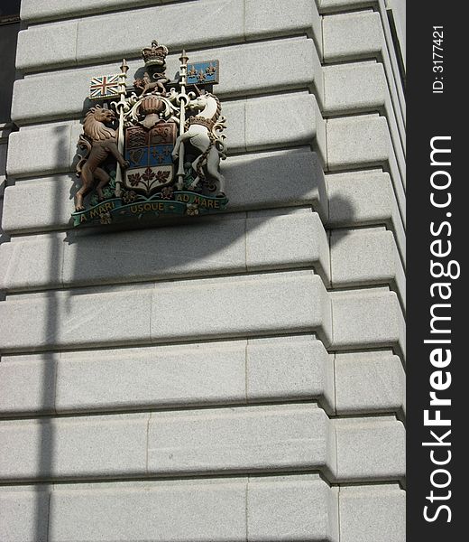 Arms And shadow of  Flag on the street of montreal