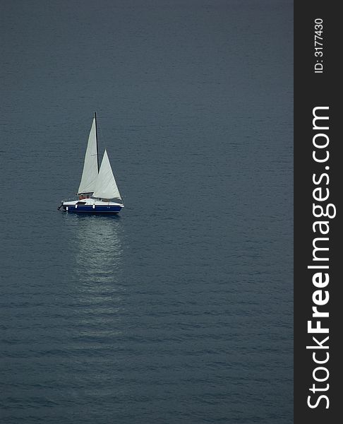 Lonely Sail Boat At The Sea Of Montenegro