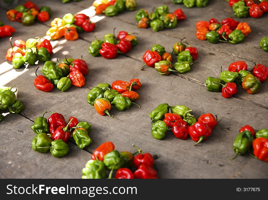 Groups of red and green chili peppers.