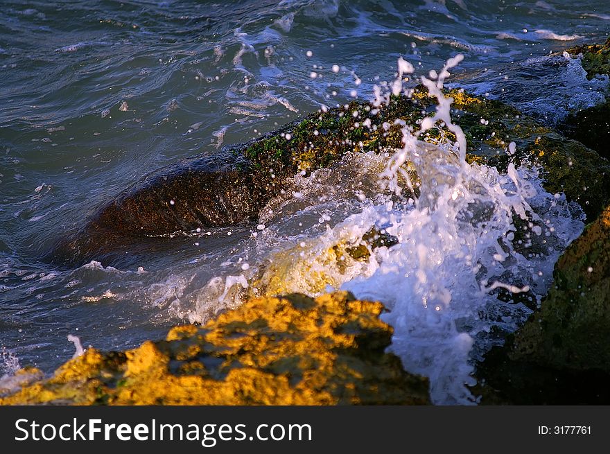 Close up of water (sea) & beack stones. Close up of water (sea) & beack stones