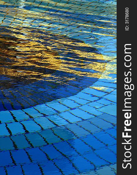 Pool with tiles in differnt shades of blue. Pool with tiles in differnt shades of blue