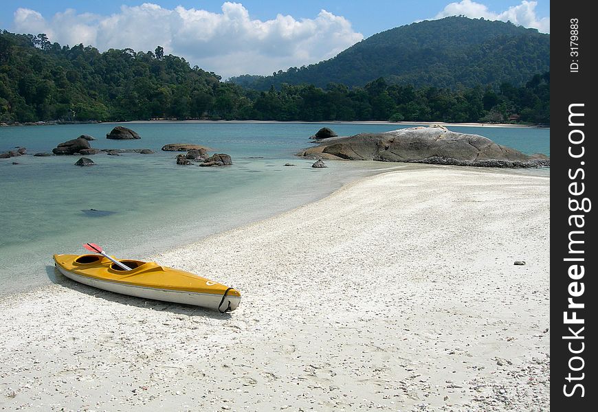 Kayak on the idyllic tropical island of Pangkor in Malaysia. Kayak on the idyllic tropical island of Pangkor in Malaysia
