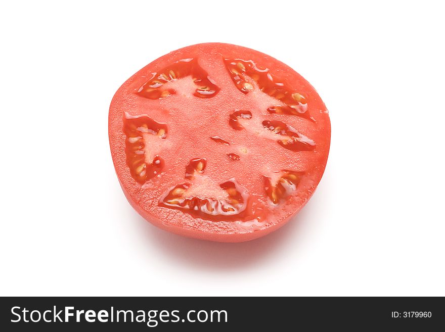 Tomato cut, isolated on white background