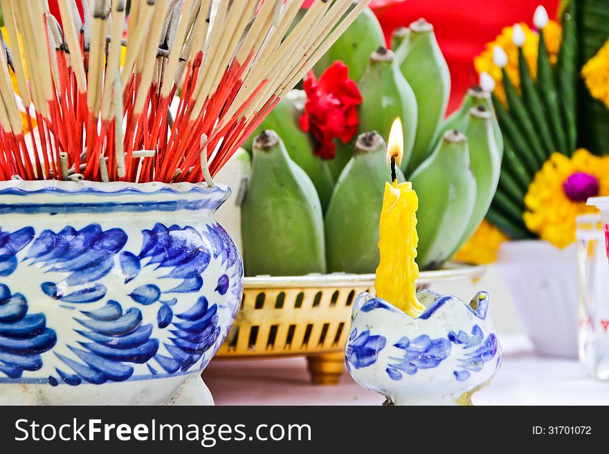 Incense pot andCandles burning