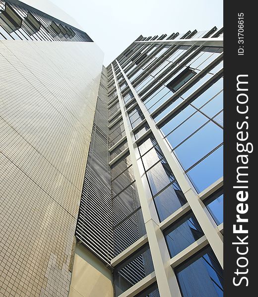 Perspective of high modern building in daytime