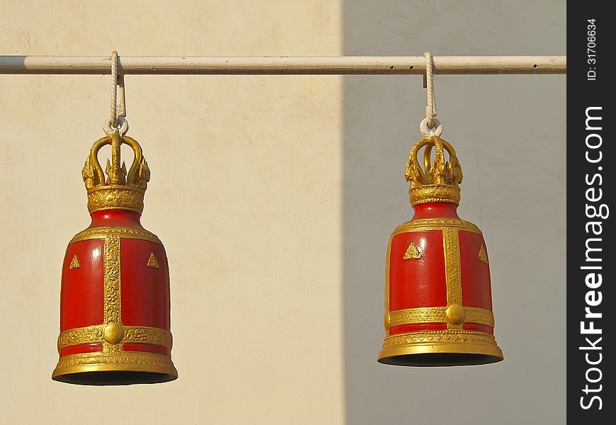 Pairs of decorative ancient red bell in Thai temple. Pairs of decorative ancient red bell in Thai temple