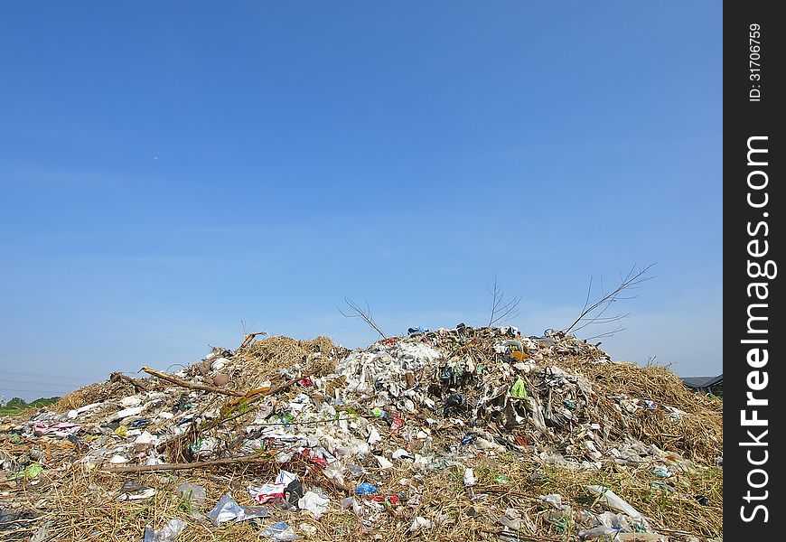 Abandoned pile of garbage in good weather day. Abandoned pile of garbage in good weather day