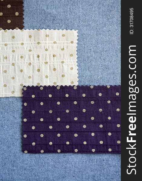 Polka dots on white and blue fabric