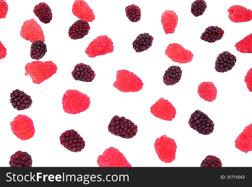 Raspberry, blackberry in a bunch isolated on white