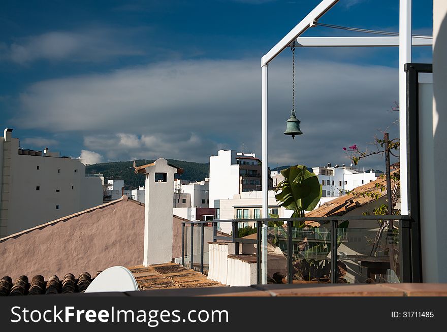 Rooftops and bell in Santa Catalina, Palma de Mallorca, Balearic islands, Spain.