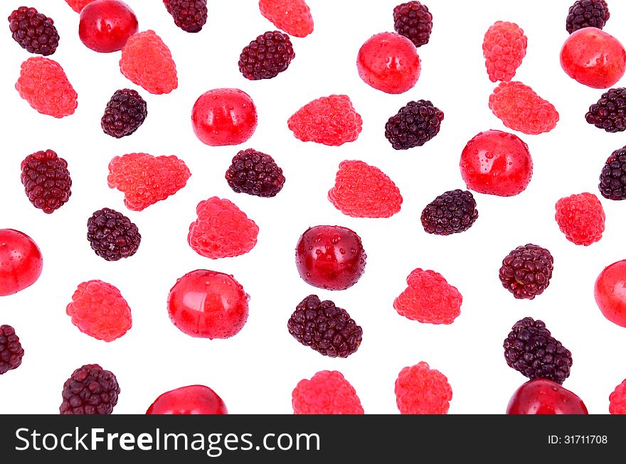 Cherry, raspberry, blackberry in a bunch isolated on white