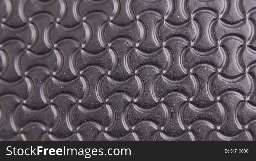 Black background with a pattern of stylized infinity