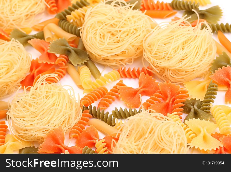 A different pasta in three colors close-up.