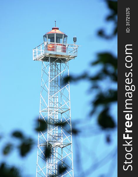 Lighthouse on the panjang island as the regulator of the sea freight traffic