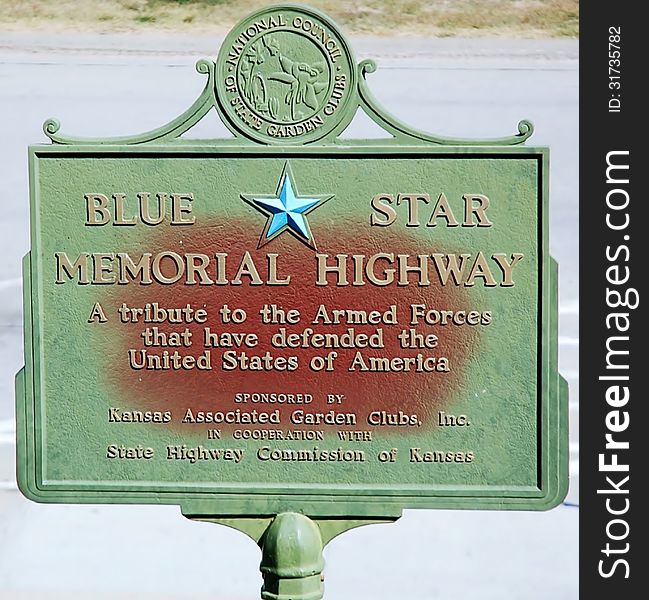 Blue star memorial highway sign in the state of Kansas ,USA,symbol of honor to the Armed Forces. Blue star memorial highway sign in the state of Kansas ,USA,symbol of honor to the Armed Forces