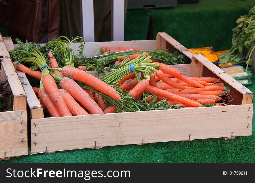 Fresh Carrots for Sale on a Market Stall. Fresh Carrots for Sale on a Market Stall.