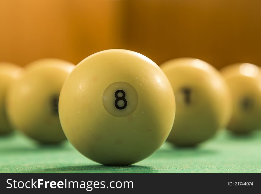 Tight focus on an old 8-ball. Tight focus on an old 8-ball