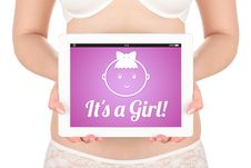 A Pregnant Woman Is Holding A Tablet Computer With The News Abou Stock Image
