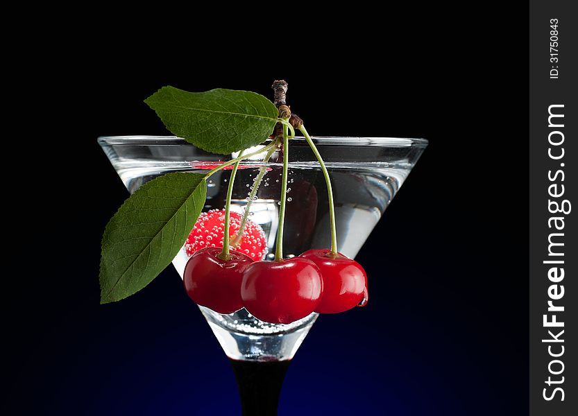 Cherries in a martini glass. Clipping path