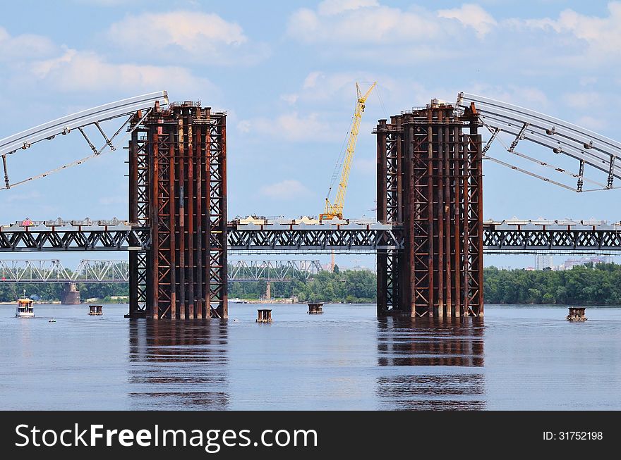 Bridge construction across Dnipro river in Kyiv, Ukraine