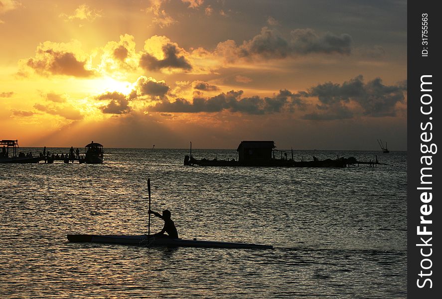 Beautiful sunset at beach located on the Promontory of the island of Java Karimun