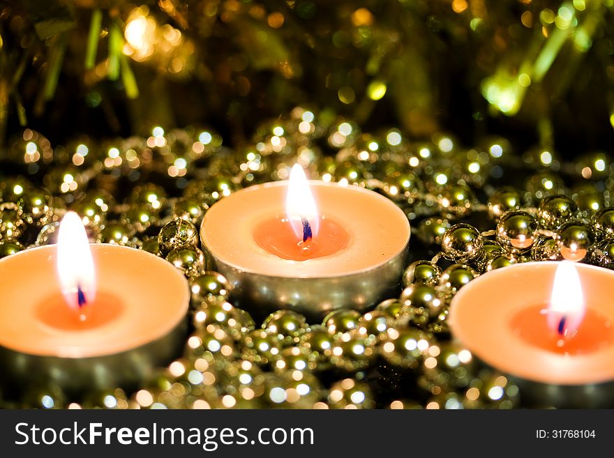 Burning candles on a background blur. Burning candles on a background blur