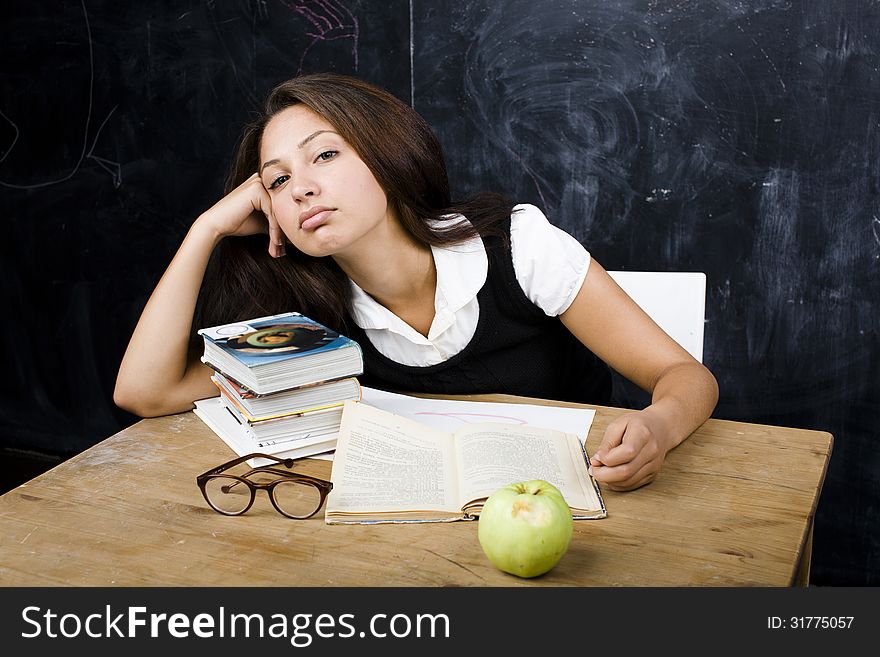 Portrait Of Happy Cute Student In Classroom