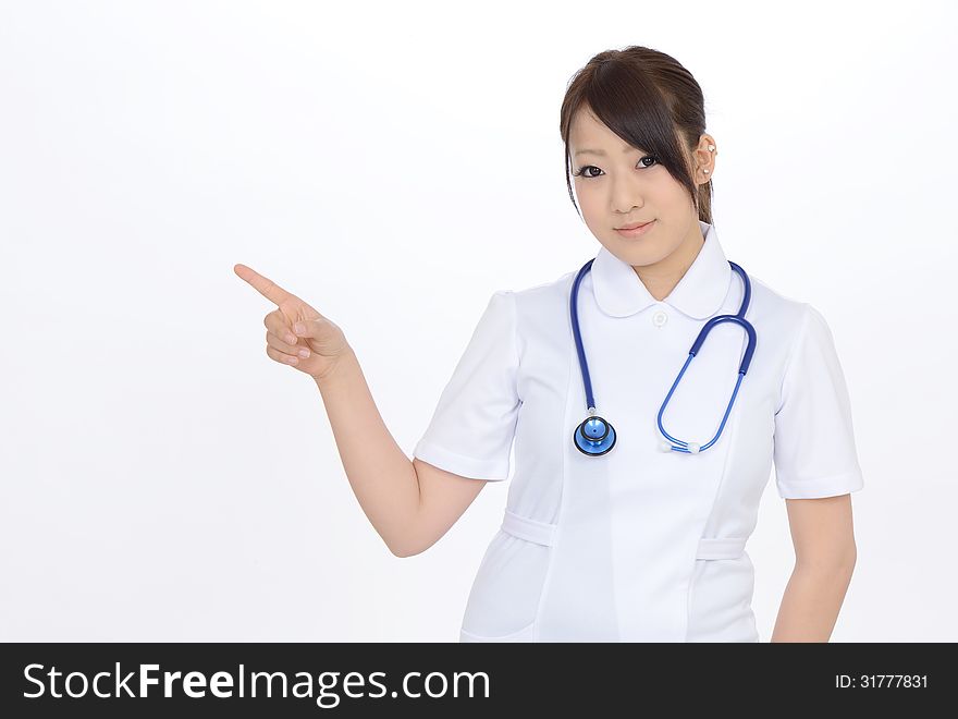 Young asian female nurse rise hand showing blank sign. Young asian female nurse rise hand showing blank sign
