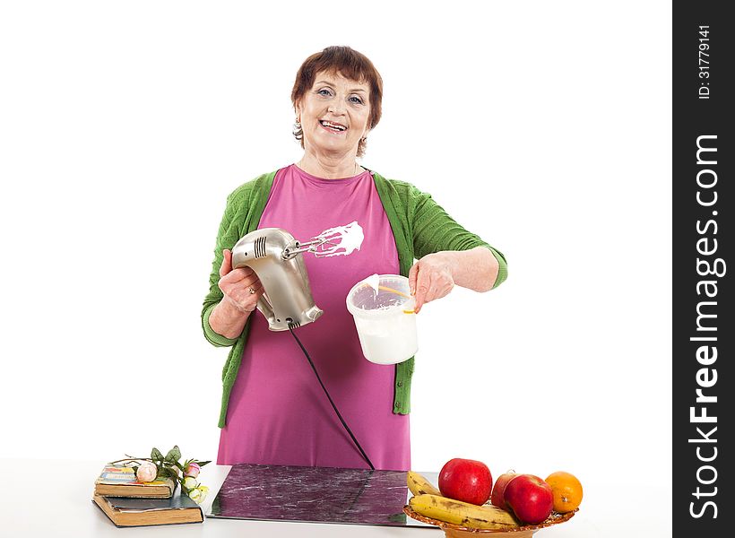 Woman cooking with mixer.