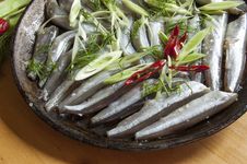 Fresh Fish Whith Cuting Onion And Pappers On An Ol Stock Photos Fresh Fish Whith Cuting Onion And Pappers On An Ol Stock Photos