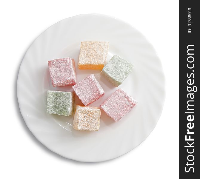 Turkish delight on a plate isolated