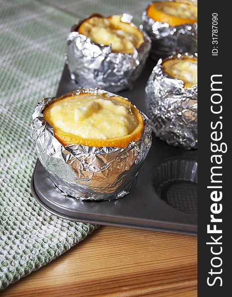 Oranges Filled With Butter Cream. Vertical Image.