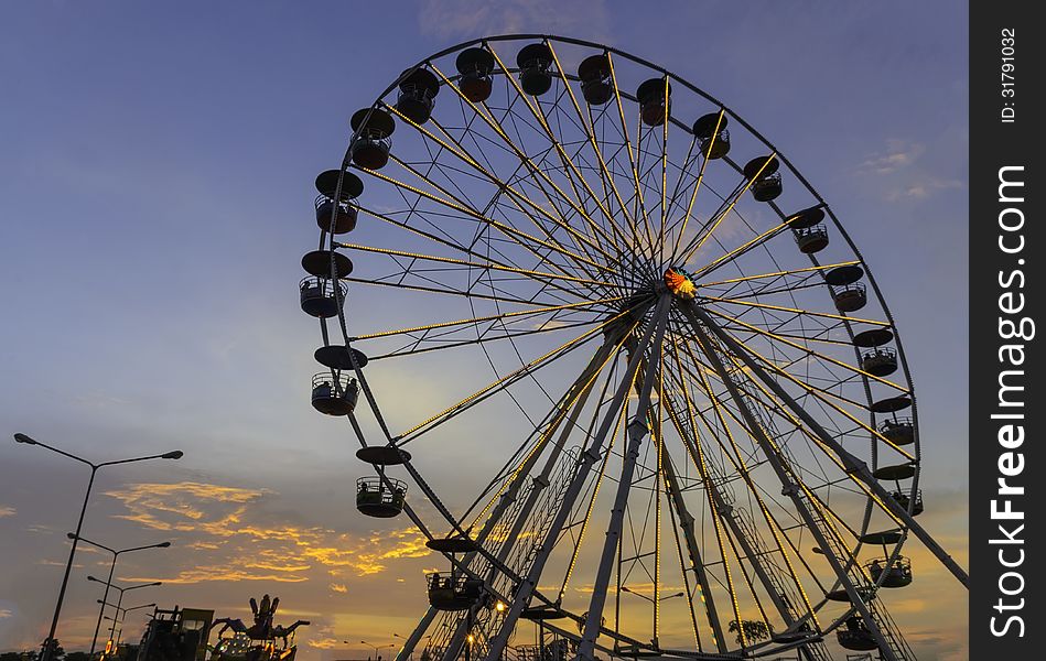 The big ferris wheel with blue sky