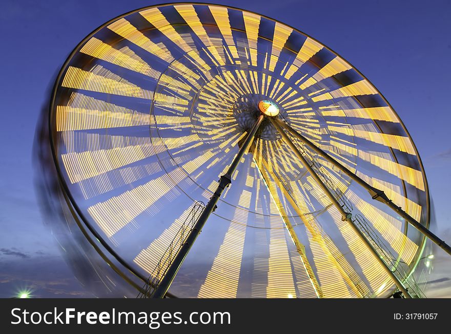 The big ferris wheel with blue sky