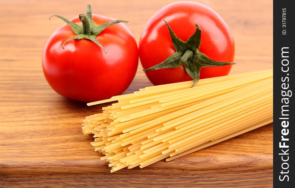 Tomatoesl And Uncooked Spaghetti