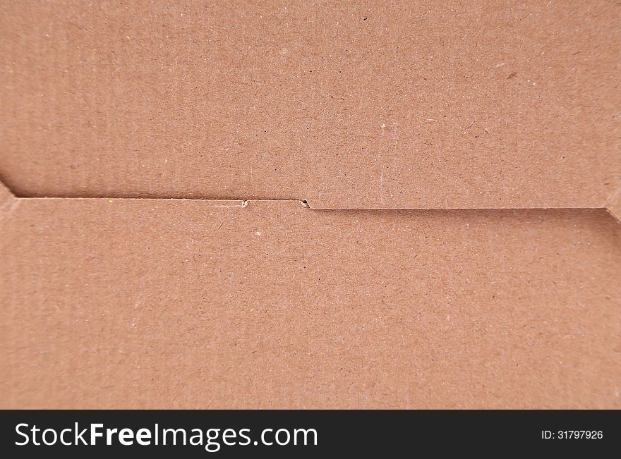 Empty cardboard box isolated close-up the whole background