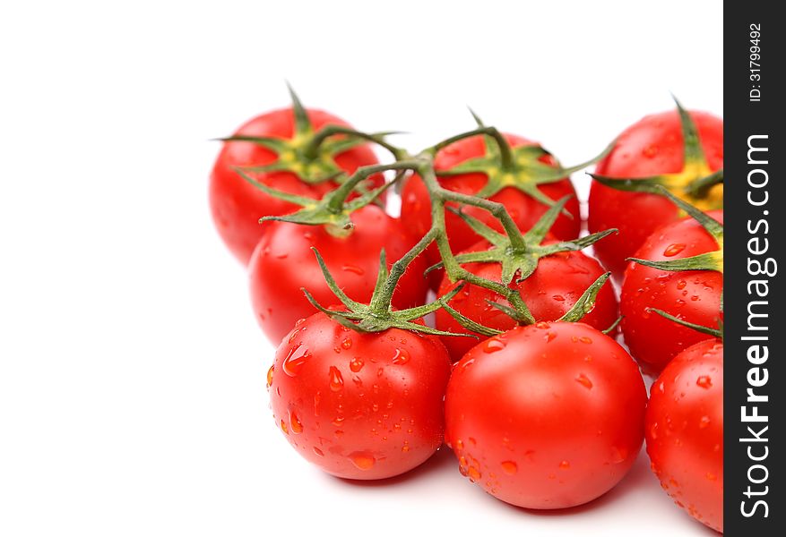 Cluster of cherry tomatoes on the white isolated background
