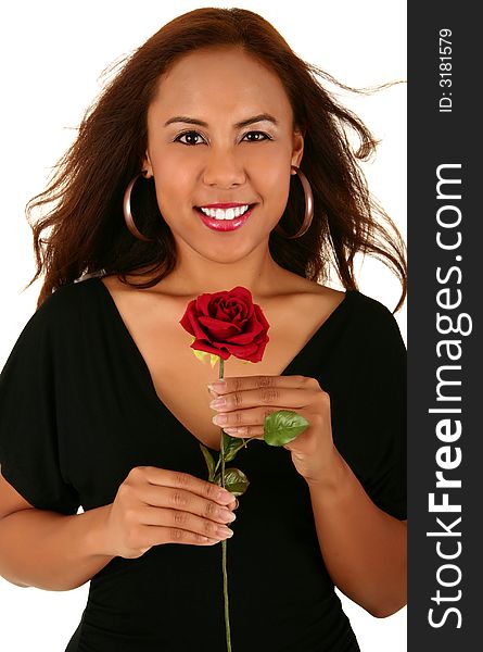 Fashion shot of woman holding red rose. skin was smoothen no noise reduction used. Fashion shot of woman holding red rose. skin was smoothen no noise reduction used