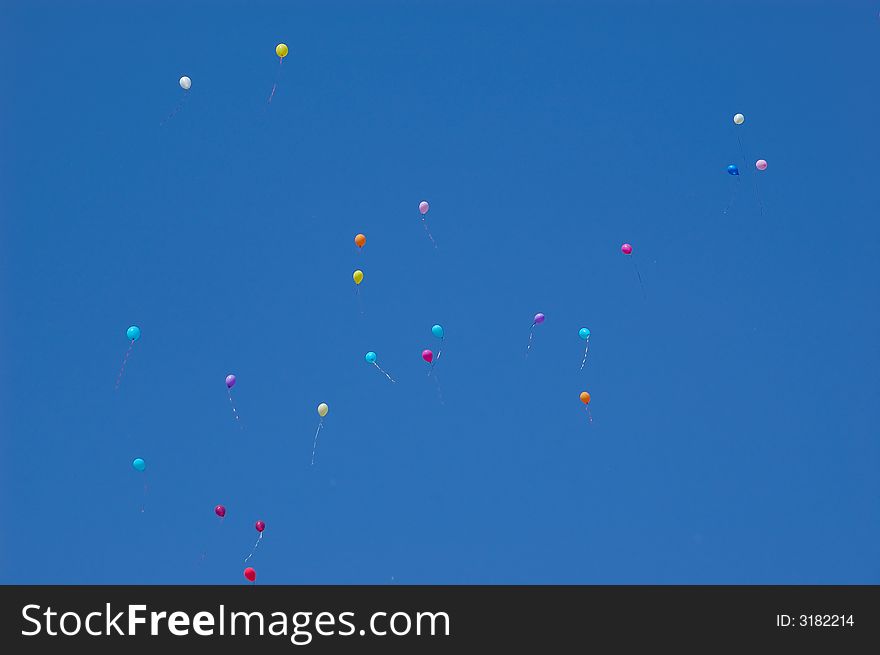 Balloons high in the clear blue sky. Balloons high in the clear blue sky